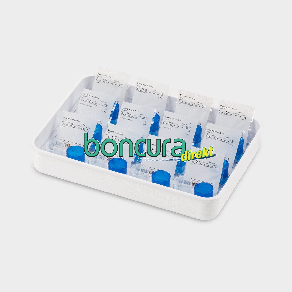 Medikamenten-Tabletts für Blistertütchen und Tropfenbecher auf einem Tablett